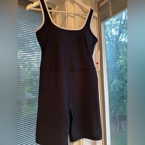 Aqua Athletic Blue and White trim woman’s